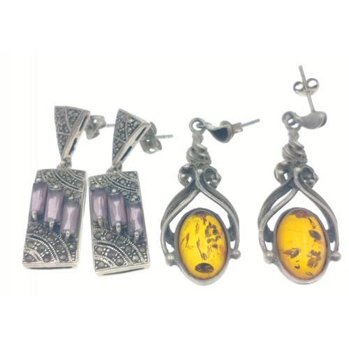 54 - Two pairs of silver earrings - one pair drop stamped 925, marcasite with three amethyst -coloured st... 