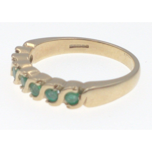 7 - 375 Hallmarked with seven even sized Emerald setting  ring size O, weight 3.55g gross approx#8