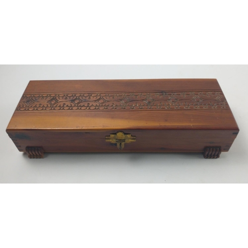 70 - A nice carved lidded wooden jewellery box dimensions 29cm length x 1-cm width x 6cm high with some c... 