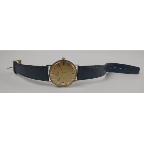 73 - A MARVIN REVUE 9ct gold cased watch with brushed brass face. Back cover weighs approx 2.9gm. Movemen... 