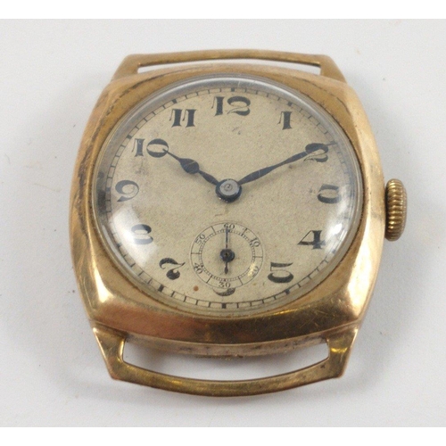 83 - A VINTAGE c1930's 375 stamped yellow gold cased vintage wrist watch with second hand dial at the foo... 