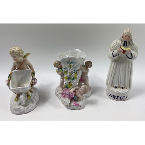 105 - Two antique china cherub form ornaments tallest 14cm, with also a Staffordshire pottery figure of JO... 