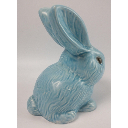 114 - A cute vintage pottery RABBIT which we believe to be 1950's WADE, stands 14cm high approx.#116