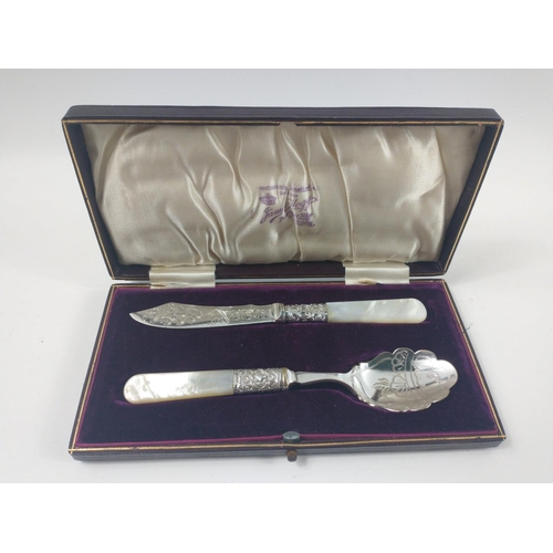 66 - Boxed set of silver plated with mother of pearl handles knife and spoon marked D& SG in original pre... 