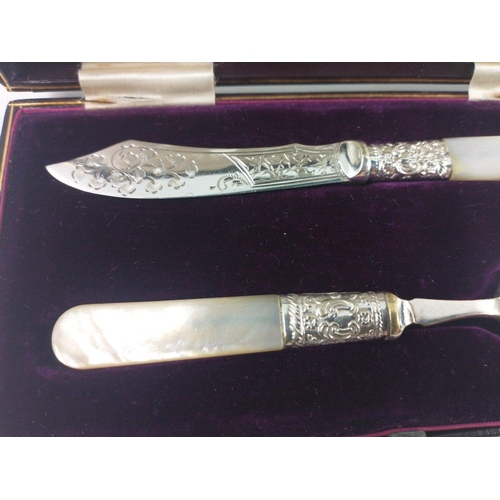 66 - Boxed set of silver plated with mother of pearl handles knife and spoon marked D& SG in original pre... 