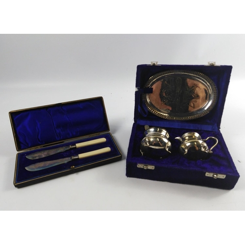 70 - A presentation box with two EPNS FISH FORKS and a second presentation box with cream and sugar bowl ... 