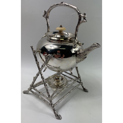 74 - A FENTON BROS silver plate SPIRIT KETTLE (19cm approx) on a curved branch style stand, total height ... 