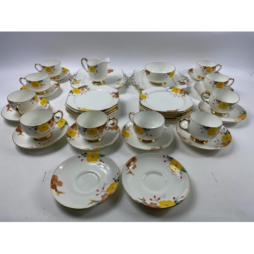 79 - ROYAL PARAGON c1930's floral patterned 10 cup tea service to include two sandwich plates#81