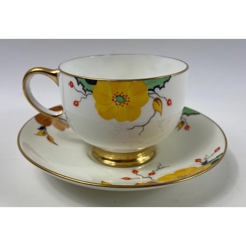 79 - ROYAL PARAGON c1930's floral patterned 10 cup tea service to include two sandwich plates#81