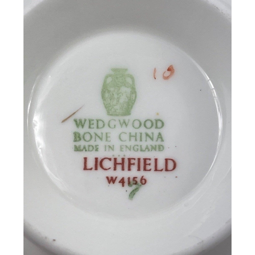 83 - Tea for two - a WEDGWOOD LICHFIELD (W4156) service for two consisting of 2 each of cups, saucers, pl... 