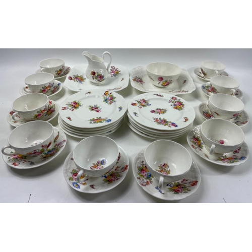 84 - A 10 cup 34 piece set of COALPORT floral patterned teaset, 10 saucers, 10 side plates, 2 large sandw... 