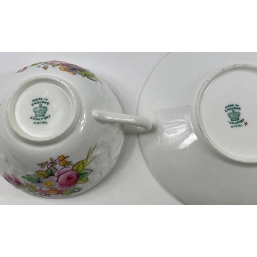 84 - A 10 cup 34 piece set of COALPORT floral patterned teaset, 10 saucers, 10 side plates, 2 large sandw... 