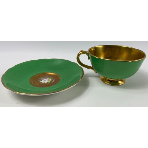 86 - A vintage pair of small PARAGON harlequin cups and saucers by appointment to HM the Queen and HM Que... 