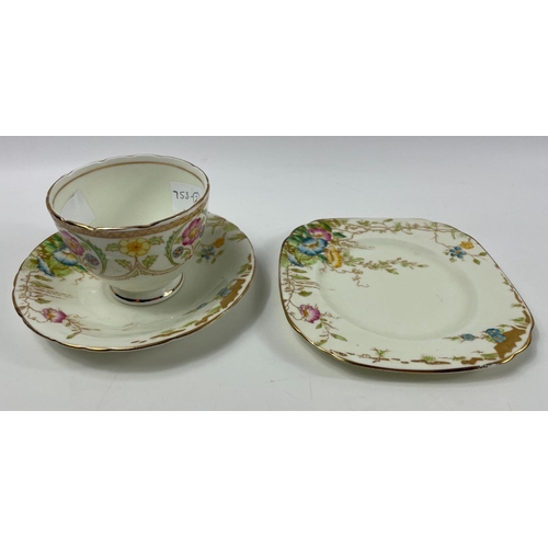 87 - A SUTHERLAND CHINA onesie of cup, saucer and square-edged side plate#89