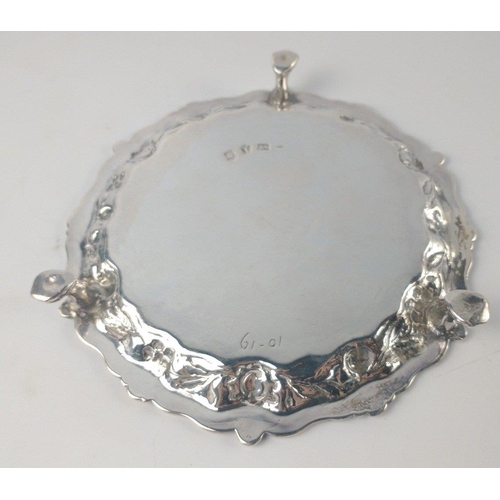 114 - A London silver hallmarked 1746 CARD TRAY with crest in centre and scalloped edge by silversmith CHA... 