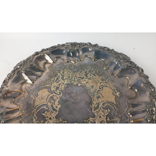 124 - Large silver plated TRAY with a decorated centre and decorative edging, 30cm diameter, 700g weight a... 