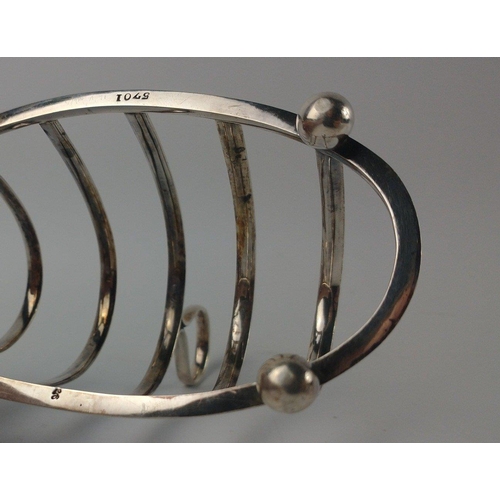 134 - A Sheffield silver hallmarked 1913 TOASTRACK by silversmith JOSEPH ROGERS & SON, height 10cm, gross ... 