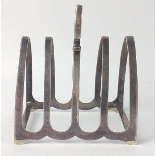 136 - A Sheffield silver hallmarked 1932 TOASTRACK by silversmith JAMES DEAKIN & SONS height 9cm, gross we... 