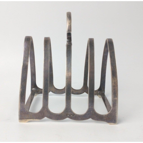 136 - A Sheffield silver hallmarked 1932 TOASTRACK by silversmith JAMES DEAKIN & SONS height 9cm, gross we... 