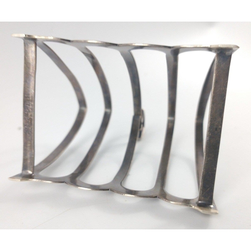 136 - A Sheffield silver hallmarked 1932 TOASTRACK by silversmith JAMES DEAKIN & SONS height 9cm, gross we... 