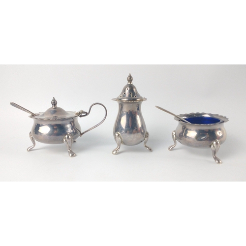 142 - A Dublin silver hallmarked 1973 CRUET SET comprising pepper, mustard and salt (salt and mustard have... 