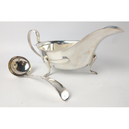 149 - Boxed set of Sheffield sterling silver 1952 SAUCEBOAT (15.5cm x 9.5cm x 8.5cm) and LADLE (length 13c... 