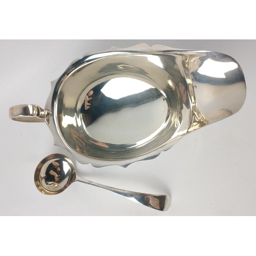 149 - Boxed set of Sheffield sterling silver 1952 SAUCEBOAT (15.5cm x 9.5cm x 8.5cm) and LADLE (length 13c... 