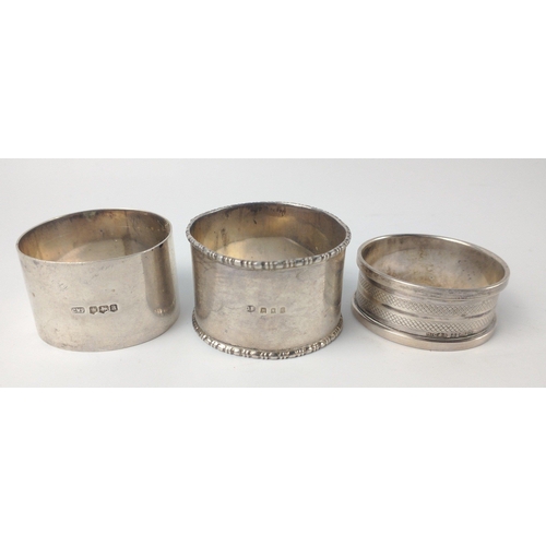 158 - A collection of eleven NAPKIN RINGS to include 2 Birmingham 1925 silver hallmarked by silversmiths R... 