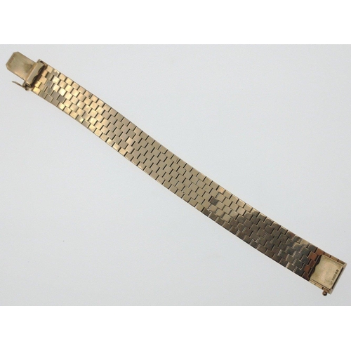 33 - 375 stamped yellow gold 'bark-effect' BRACELET length 17cm x 1.5cm width, and weight 40g approx#35... 