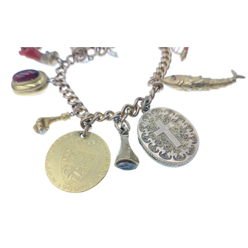 37 - SIMPLY EXQUISITE!!! A VICTORIAN 9ct stamped yellow gold charm BRACELETwith 10 charms, to include two... 