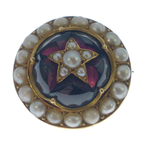 40 - Possibly VICTORIAN 'yellow metal' circular red stone and pearl set BROOCH, dimension 2cm diameter, g... 