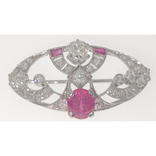 50 - A VINTAGE DIAMOND encrusted 'white metal' pin BROOCH with a central pink stone (0.5cm diameter) leng... 