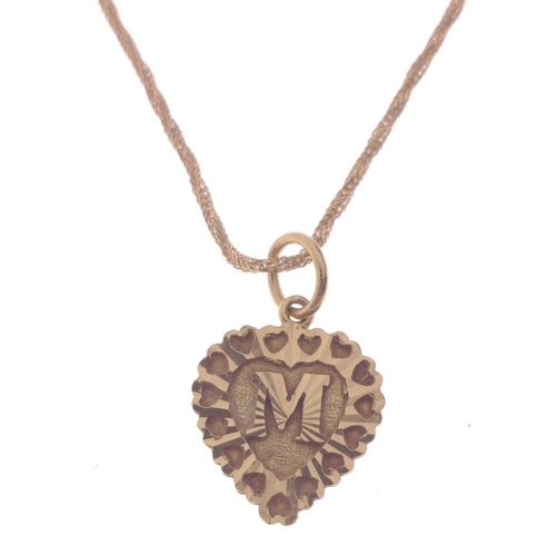 55 - A 750 stamped yellow gold twist link CHAIN with heart shaped pendant with the letter 'M' centre, cha... 