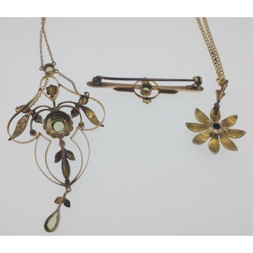 69 - BEAUTIFUL!An early 20th century 9ct stamped yellow gold floral form PENDANT with seed pearls and a c... 