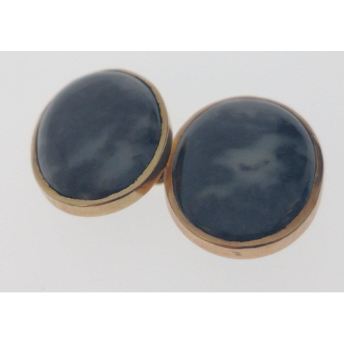 82 - A VINTAGE pair of 'yellow metal' base and greyish/whiteish oval cut stone CUFFLINKS in original Lond... 