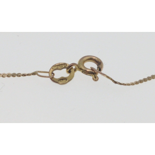 88D - A 9ct gold chain with pearl and white stone pendant, chain 40cm, gross weight 2g plus a pair of pear... 