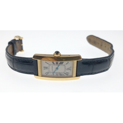 93 - CARTIER tank ladies WRIST WATCH 750 stamped casing complete with a sapphire within the watch winder,... 