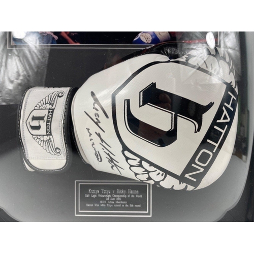 40 - OOUCH!! A boxing glove signed by RICKY HATTON in a frame with a photo of his victory over Kostya Tsz... 