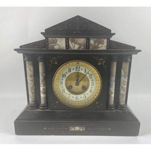 68 - A VICTORIAN mantel clock to impress, a slate Romanesque style clock 32cm tall, 34cm wide , Very heav... 