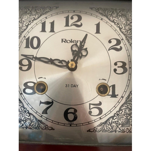 73 - A nice 31 day wall clock  by ROLEN dimensions 50cm height x 22cm width#74