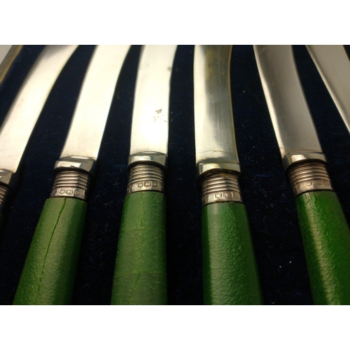 77 - A set of six green-handled silver butter knives, hallmarked Sheffield 1918, by silversmith James A S... 