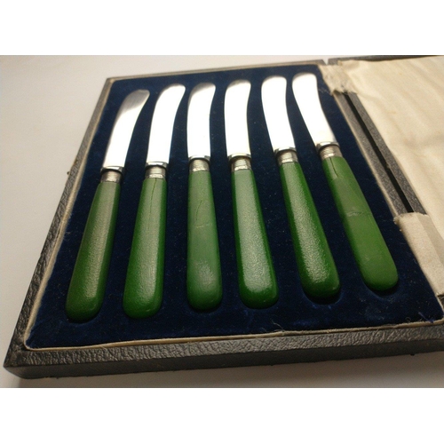 77 - A set of six green-handled silver butter knives, hallmarked Sheffield 1918, by silversmith James A S... 