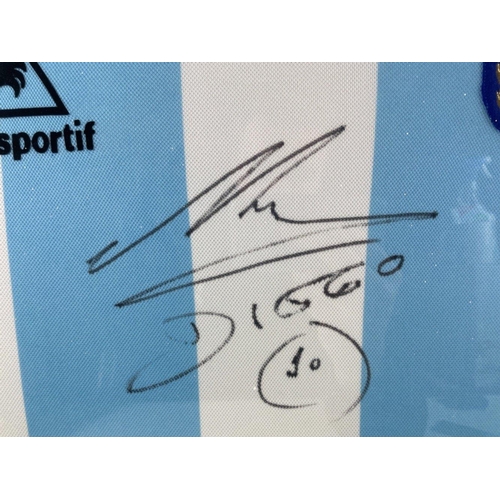 38 - SUPER COLLECTABLE!! An ARGENTINA football shirt signed by Diego Maradona, frame size 69 x 68cm#8