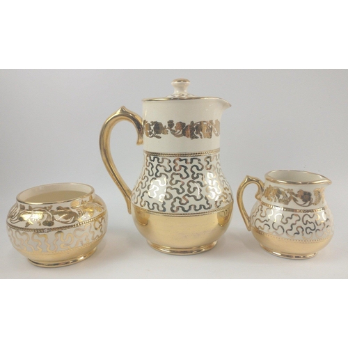 101 - A nice three piece SADLER branded ceramic coffee pot with cream and sugar in gold decorative design#... 