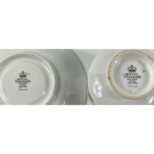 107 - A ROYAL STANDARD Trend pattern with 22 kt gold rims tea service to include 6 cups, 9 saucers, 9 side... 