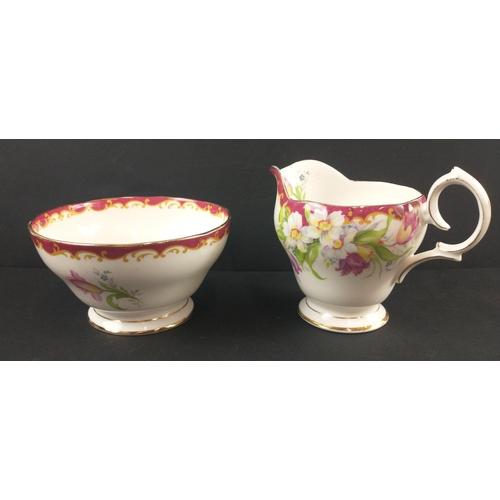 110 - A Vintage five cup QUEEN ANNE tea service with six saucers and six side plates in the floral and col... 