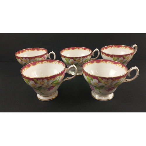 110 - A Vintage five cup QUEEN ANNE tea service with six saucers and six side plates in the floral and col... 