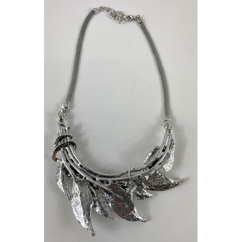 18 - QUALITY! BOUTIQUE bought from YORK a Substantial handmade white metal TORQUE in leaf form with a nic... 