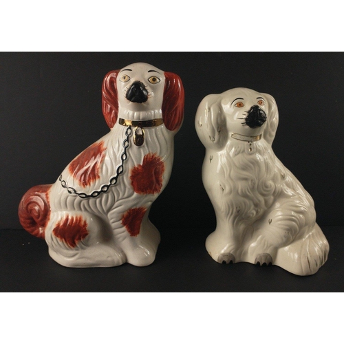 250 - A collection of three WALLY DUGS ranging in height from 21cm (made by BESWICK), to 24cm to the talle... 