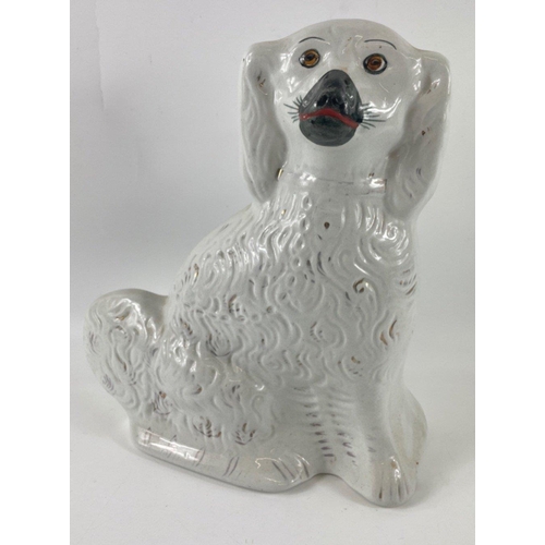 251 - A ceramic flatback mantle dog with hand painted eyes and face 30cm tall x 26cm wide(at base), no chi... 